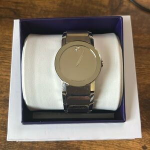 Mens used Movado silver on silver timepiece.  See picture for condition details.